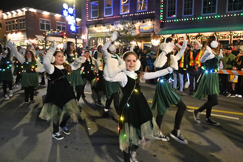 Kids with Chilliwack Gymnastics and Dance take part in the Rotary Christmas Parade on Yale Road in Chilliwack on Saturday, Nov. 30, 2024. 