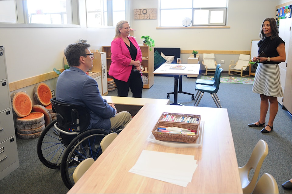 Nicole Driscoll, principal of early learning and child care with the Chilliwack School District (right) shows MLAs Dan Coulter and Kelli Paddon the new before- and after-school care space at Greendale Elementary Community School on Thursday, Sept. 5, 2024.