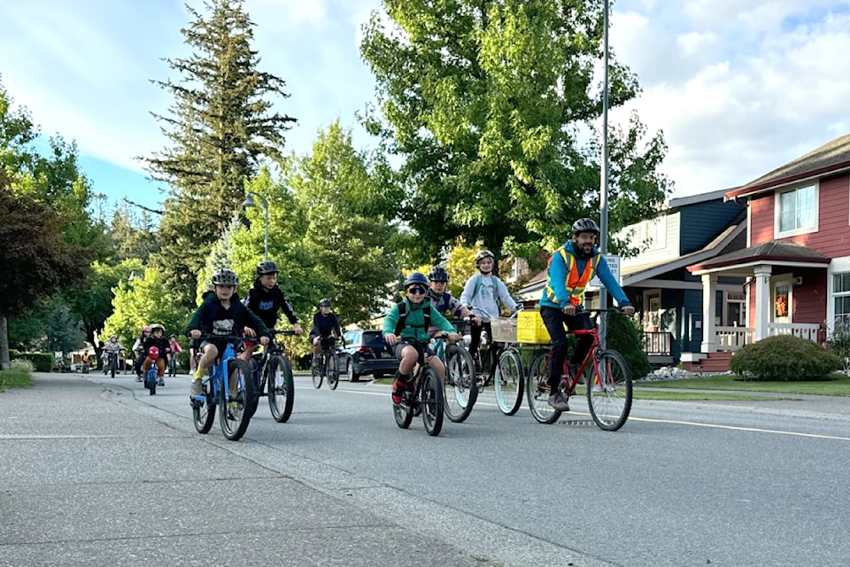 The Garrison Bike Bus on Sappers Way, on the way to Watson Elementary School in Chilliwack, Sept. 17, 2024. 