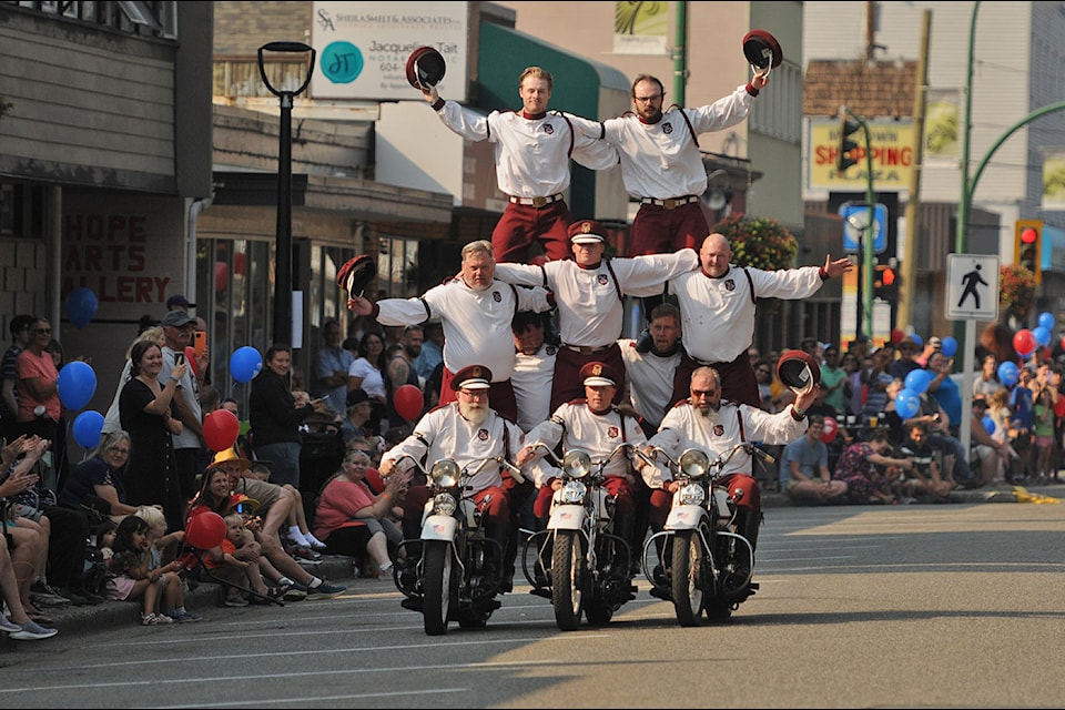 Members of the Seattle Cossacks motorcycle stunt team perform on Wallace Street during the 55th annual Hope Brigade Days on Saturday, Sept. 7, 2024.