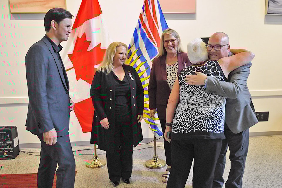Chilliwack-Kent MLA Kelli Paddon (second from left) smiles after Jason Lum (from left), Julie Unger, Sylvia Pranger and Bradley Gionet each received a King Charles III Coronation Medal on Tuesday, Sept. 3, 2024 at the Chilliwack Cultural Centre. 