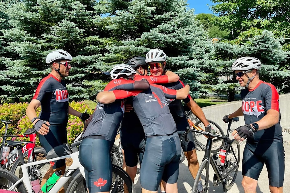 The National Ride of Hope team celebrates arriving in St. John's, Newfoundland on Thursday, July 10, 2025.