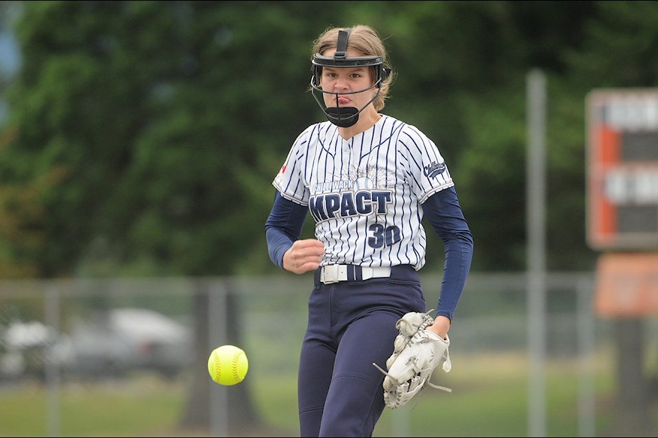 Dani Pankratz with the U15B Chilliwack Impact pitches to a  Xtreme player during the District 8 softball playoffs at Townsend Park in Chilliwack on Saturday, June 21, 2025. The event was hosted by Chilliwack Minor Fastpitch.