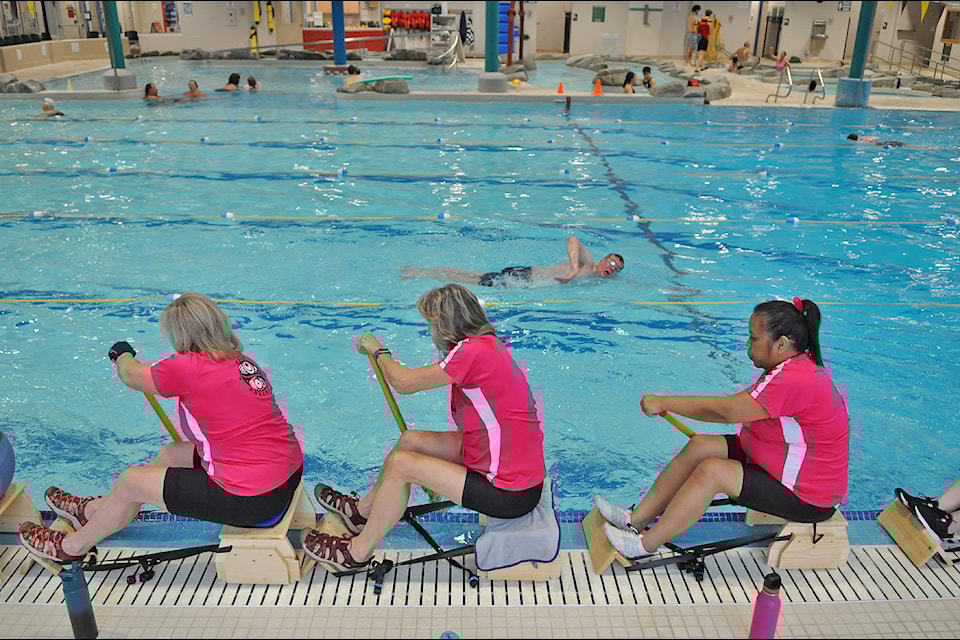 Members of Spirit Abreast, a Chilliwack-based dragon boat team made up of breast cancer survivors, practise paddling techniques at the Cheam Leisure Centre on Saturday, March 15, 2025.