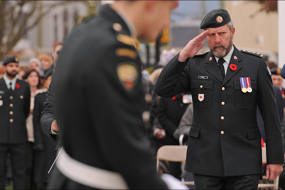 Chuck Strahl salutes as he walks up to lay a wreath during the Remembrance Day ceremony at Veterans' Memorial Park in downtown Chilliwack on Nov. 11, 2022. He died on Aug. 13, 2024 after a battle with mesothelioma.
