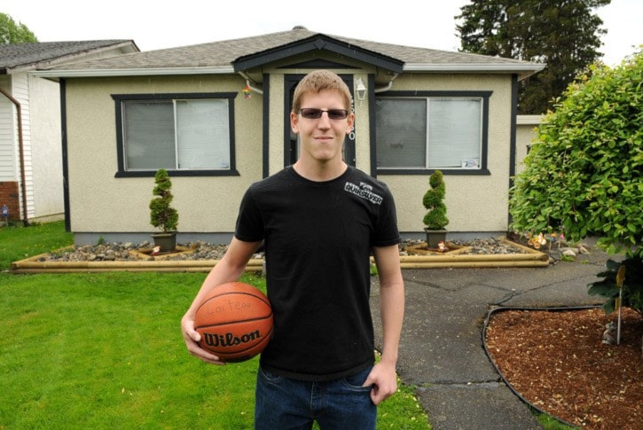 Kyle Lorteau stands outside his dad's house. JENNA HAUCK/ PROGRESS