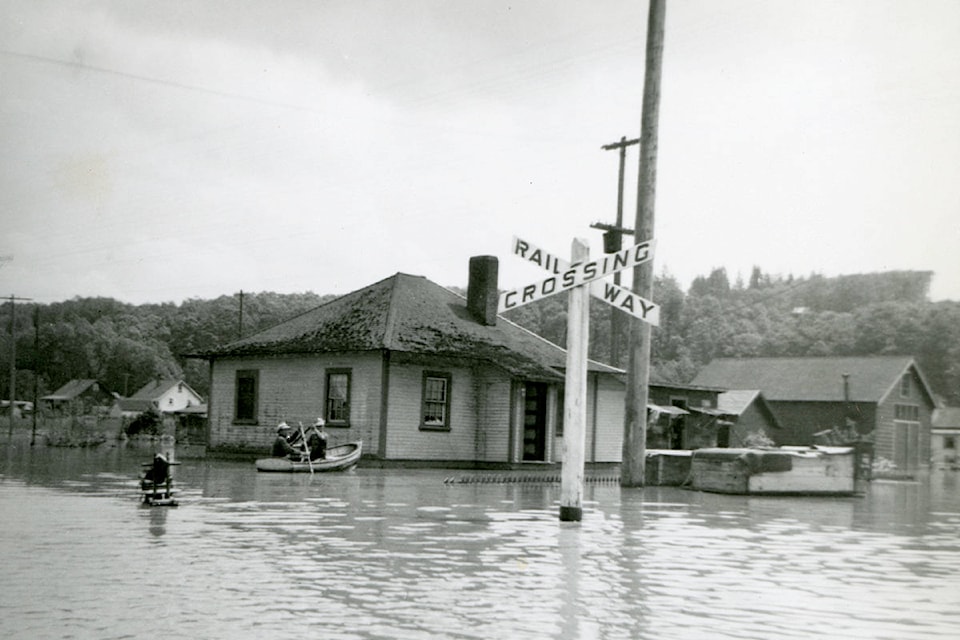 12307676_web1_copy_180627-CLR-HIST-1948FraserFloods_1