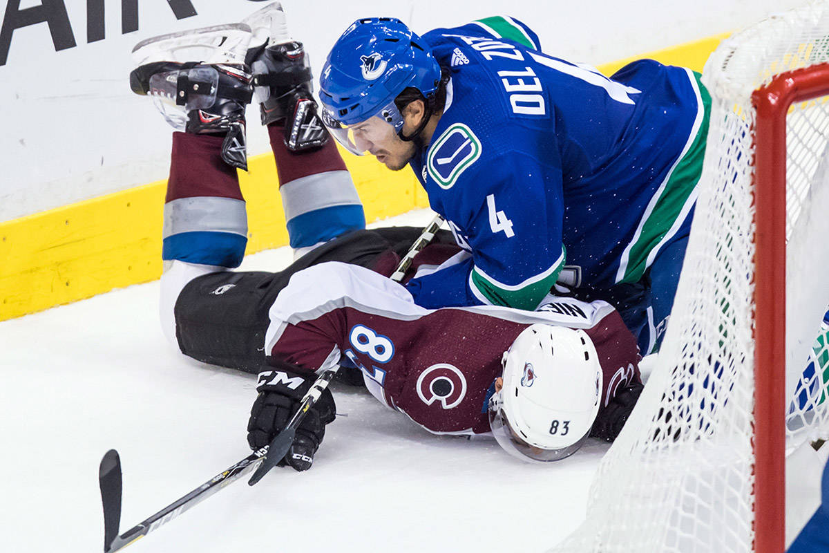 14248827_web1_181102-IFD-Canucks-Avs