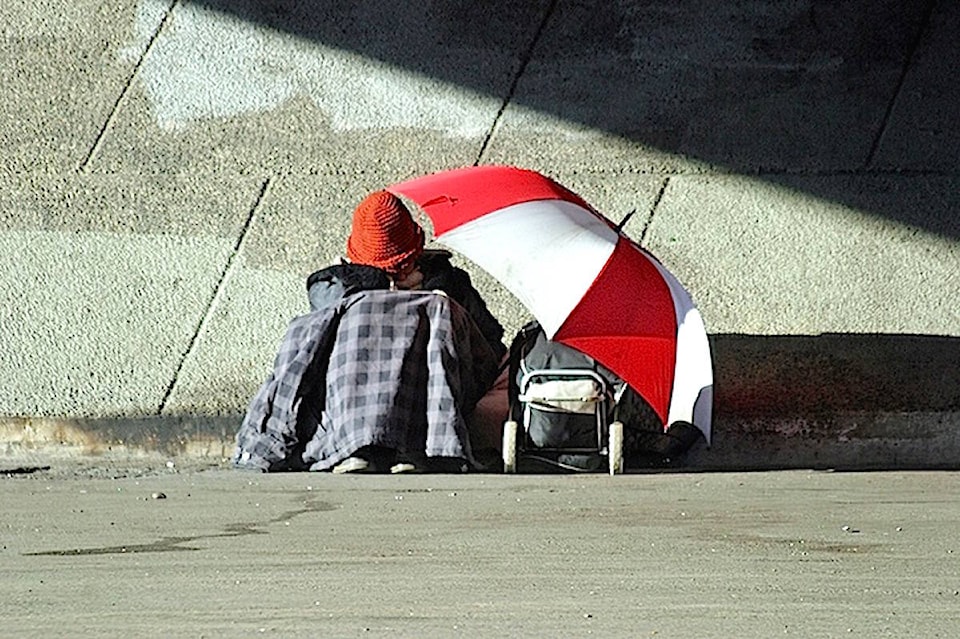 14341527_web1_Homeless-umbrella