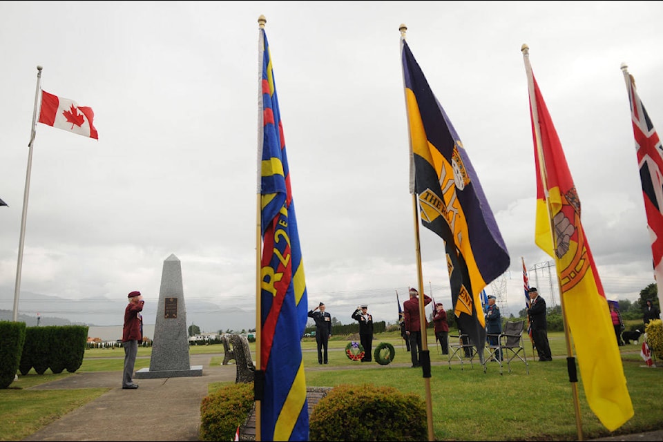 People gather to commemorate the 76th anniversary of D-Day at Legion Memorial Gardens in Chilliwack on Saturday, June 6, 2020. (Jenna Hauck/ The Progress)