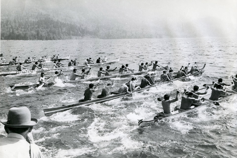 Some of the 19 craft of 11-man war canoes at the “Cultus Lake Indian Festival” on June 6, 1961. (Chilliwack Progress Press 1999.029.010.024)