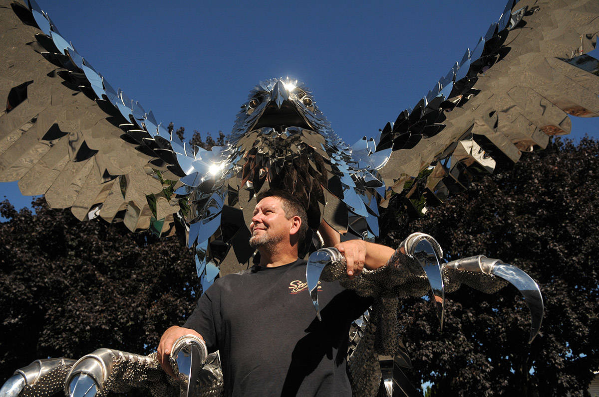 Artist Kevin Stone made this 3,000-pound stainless steel falcon, seen here on display outside his business on Rowat Avenue in Chilliwack on Sept. 29, 2020. (Jenna Hauck/ Chilliwack Progress)