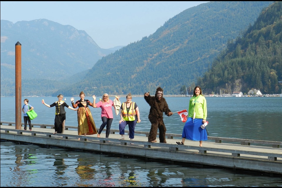 Harrison Hot Springs Elementary staff members (left to right) La Vern Klassen, Helen Evans, Wendy Weaver, Margot Lawrence, Sasquatch (not of HHSE, to be clear), and Principal Tammy Nazarchuk pose shortly before flinging themselves into Harrison Lake on Friday, October 2. Nazarchuk said she would take the plunge if students raised $1,000 for the Terry Fox Run. Fellow staff joined her when they raised $2,200. (Adam Louis/Observer)