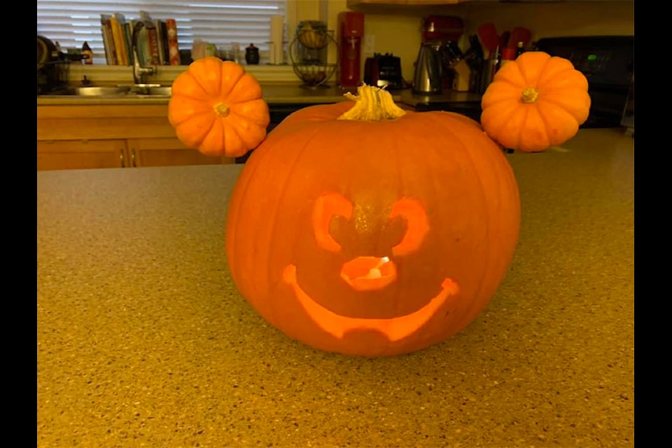Not all pumpkins have to be scary, as Elizabeth Faith Castillo showed up with this Mickey Mouse lookalike.