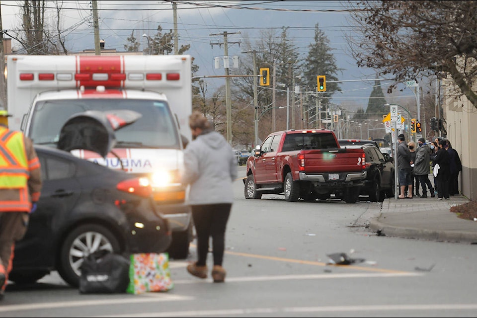 A black sedan, white SUV, red pickup truck and black hatchback were all involved in a four-vehicle collision at Hodgins Avenue and Yale Road on Friday, Feb. 26, 2021. (Jenna Hauck/ Chilliwack Progress)