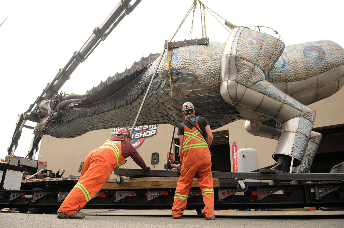 Crews prepare to move Kevin Stones 8,000-pound unfinished steel dragon from Stones Speed Shop to a new location in Yarrow on Thursday, April 29, 2021 (Jenna Hauck/ Chilliwack Progress)