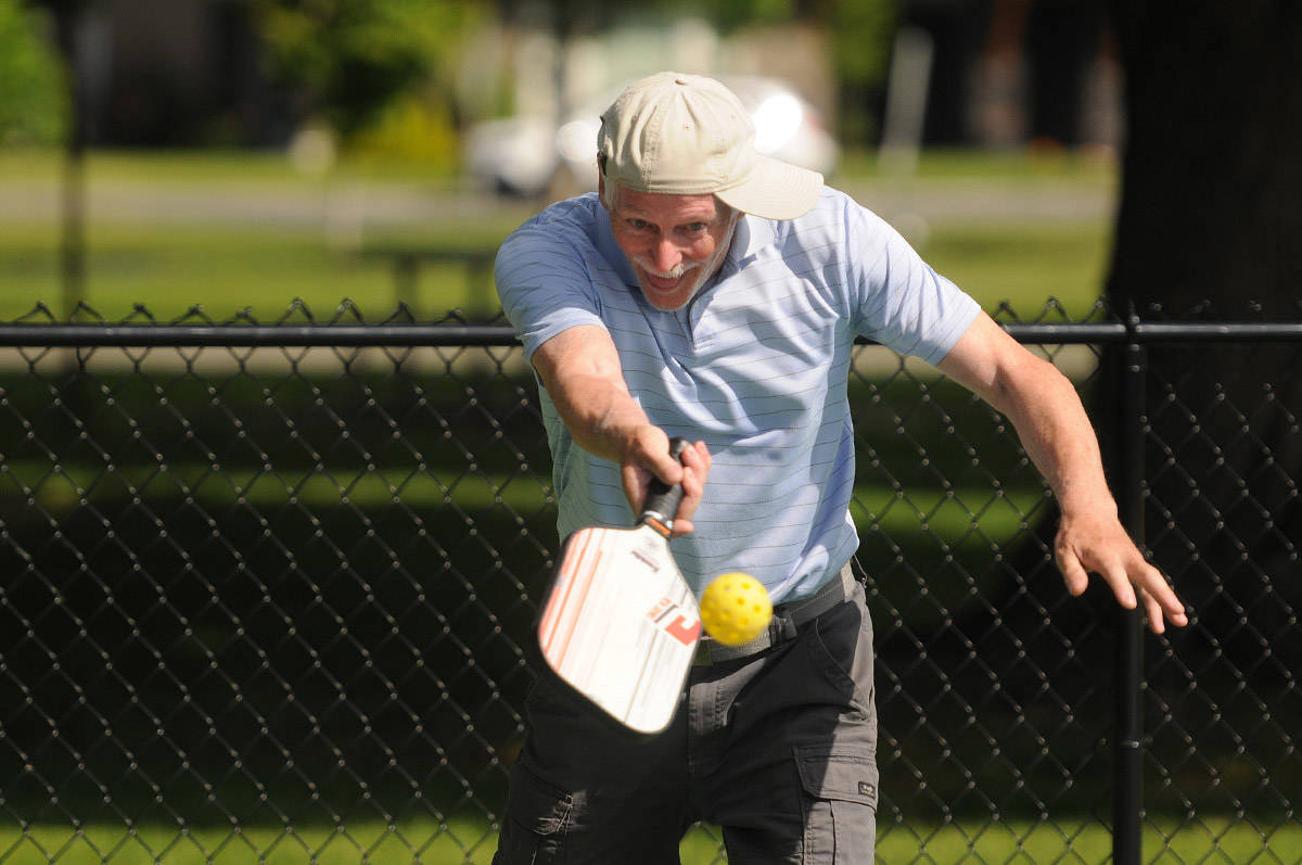 Ray Hart plays pickleball on the new courts at Kinsmen Park in Chilliwack on Tuesday, May 25, 2021. (Jenna Hauck/ Chilliwack Progress)