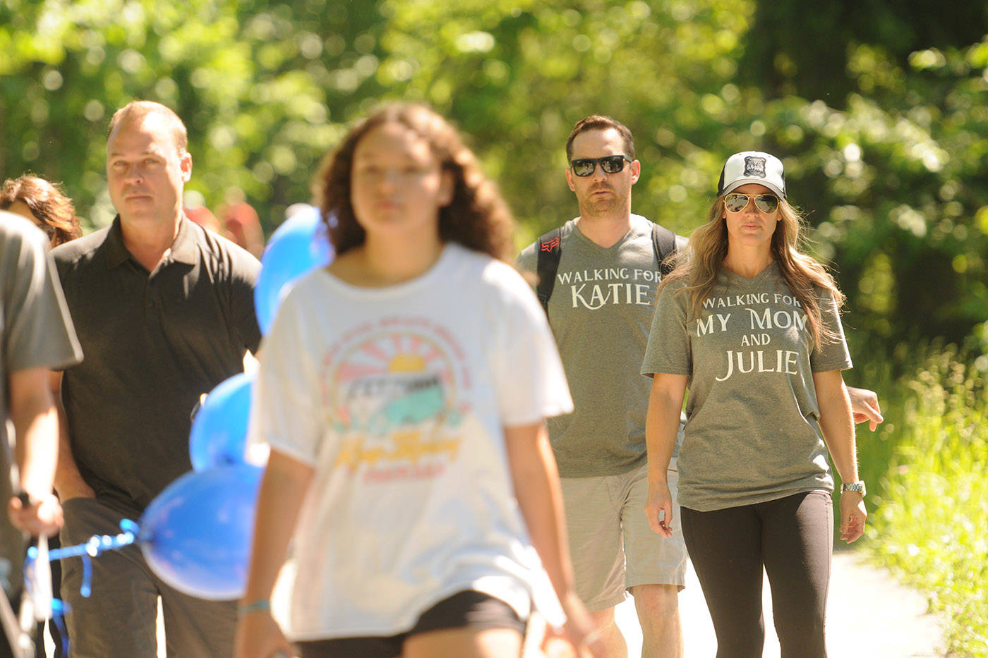 Katie Hogan (right) was diagnosed with early-onset Alzheimers disease in January. The 43-year-old Chilliwack woman is seen here taking part in the Walk for Alzheimers with family and friends on the Vedder Rotary Trail on Saturday, May 29, 2021. (Jenna Hauck/ Chilliwack Progress)