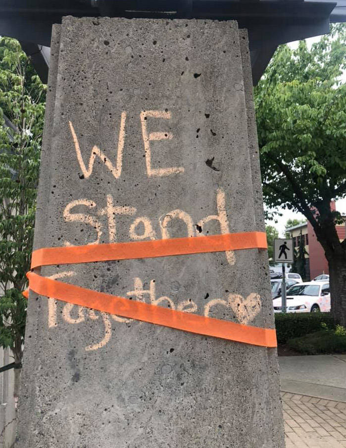 A message in orange chalk at Central Community Park in Chilliwack on Thursday, July 2021. (Margaret Reid)