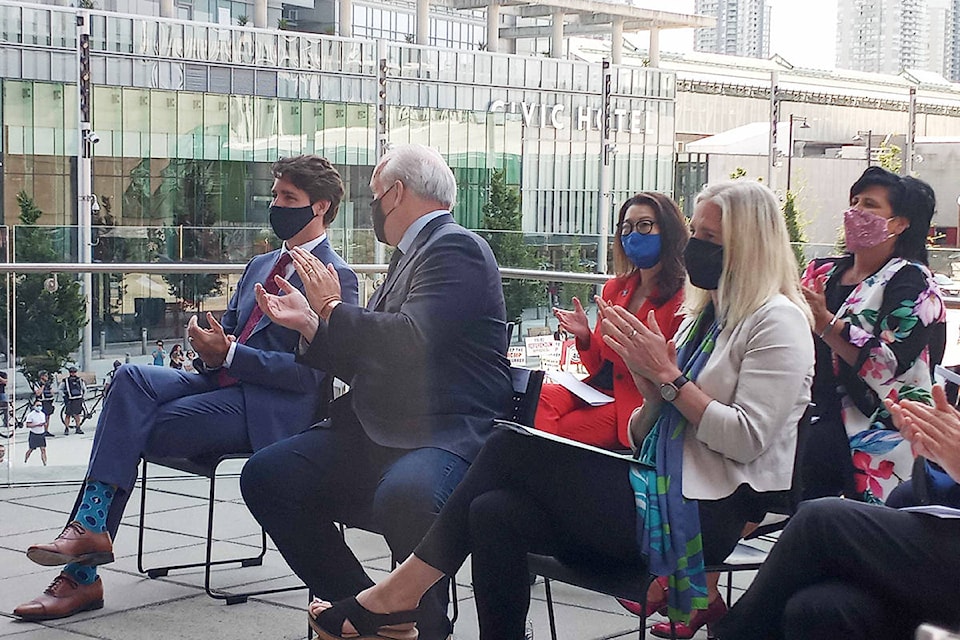 Prime Minister Justin Trudeau (left) joined Premier John Horgan and other local mayors, MLAs, and dignitaries at an announcement Friday, July 9, about funding for transit and SkyTrain in Surrey. (Malin Jordan/Black Press Media)