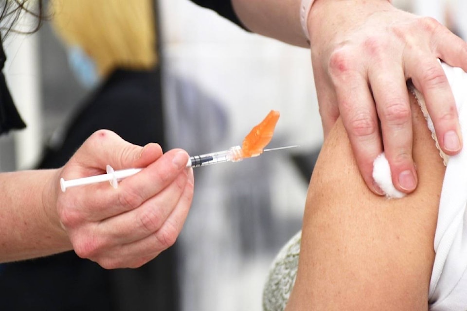 26057336_web1_210729-MRN-CF-vaccine-hub-jab_1