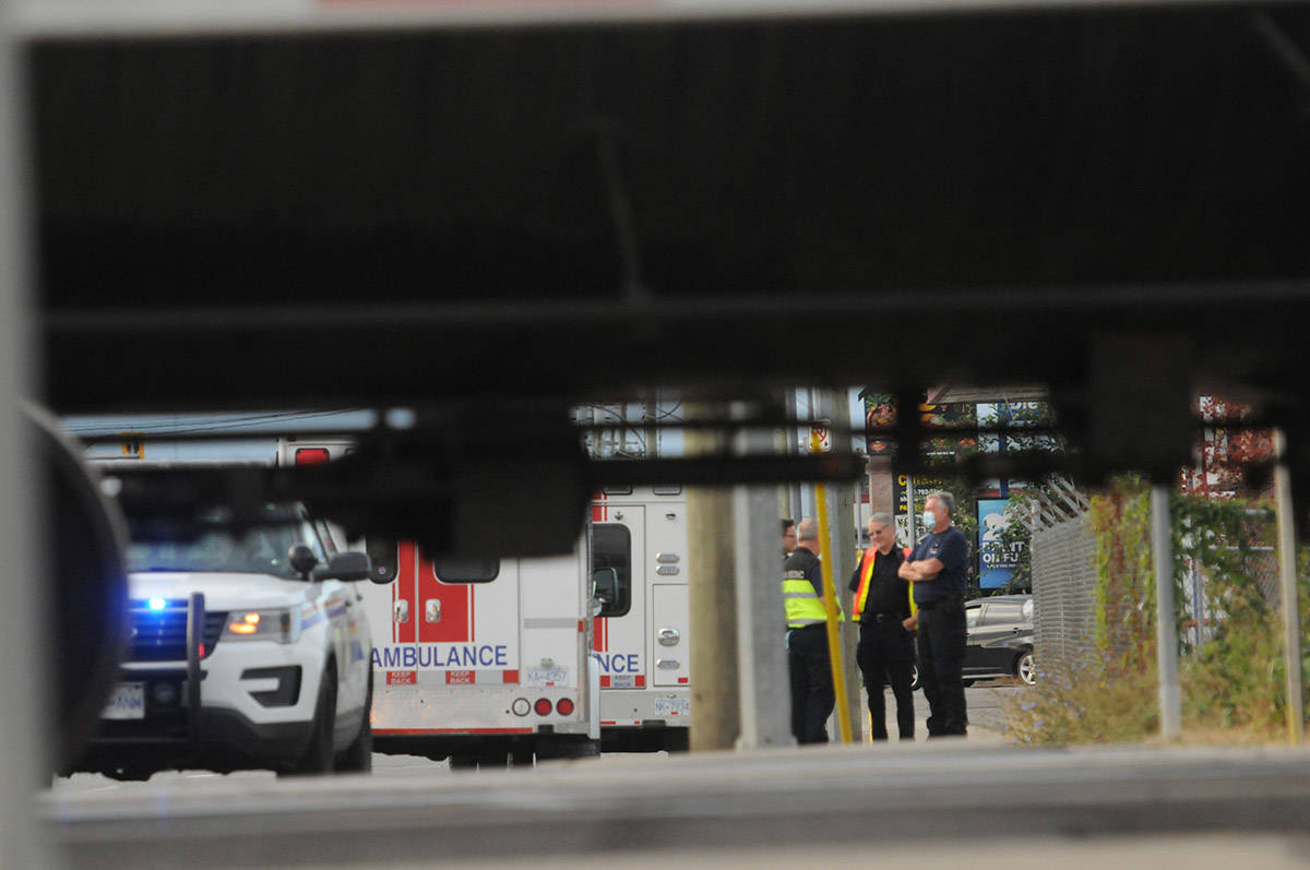 Emergency crews are on scene at the railway crossing on Young Road for a pedestrian who was reportedly struck by a train in Chilliwack on Thursday, Aug. 19. (Jenna Hauck/ Chilliwack Progress)