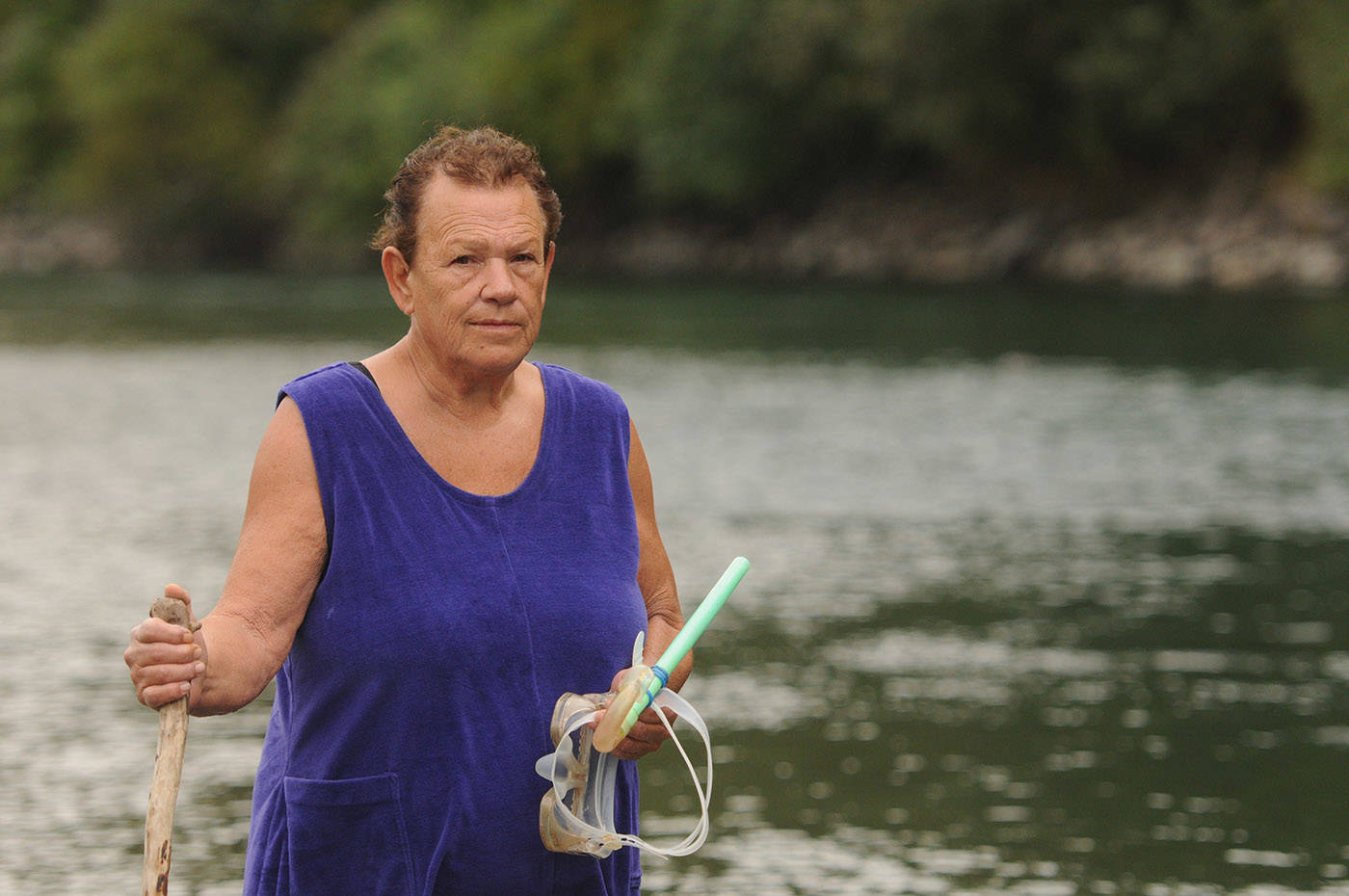 Bonnie Whyte stands near the spot where a motorboat zipped by her, just 10 feet away from her, while she was swimming in the Vedder River on Wednesday, Aug. 18, 2021. Im actually very lucky I got out of the way, she said on Aug. 20. (Jenna Hauck/ Chilliwack Progress)