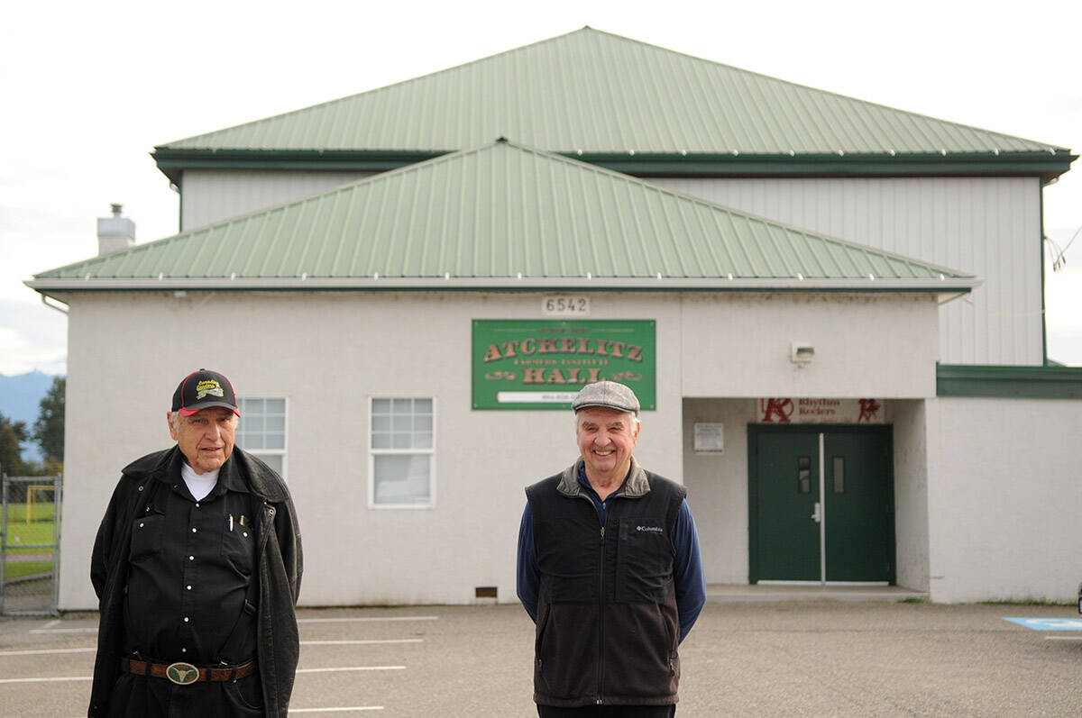 Pat MacPhail (left) and Bob Simpson, seen here on Oct. 8, 2021, are two of the seven members of the Atchelitz Farmers Institute. The AFI is in the process of closing down and they have gifted their property on Lickman Road to the City of Chilliwack. (Jenna Hauck/ Chilliwack Progress)