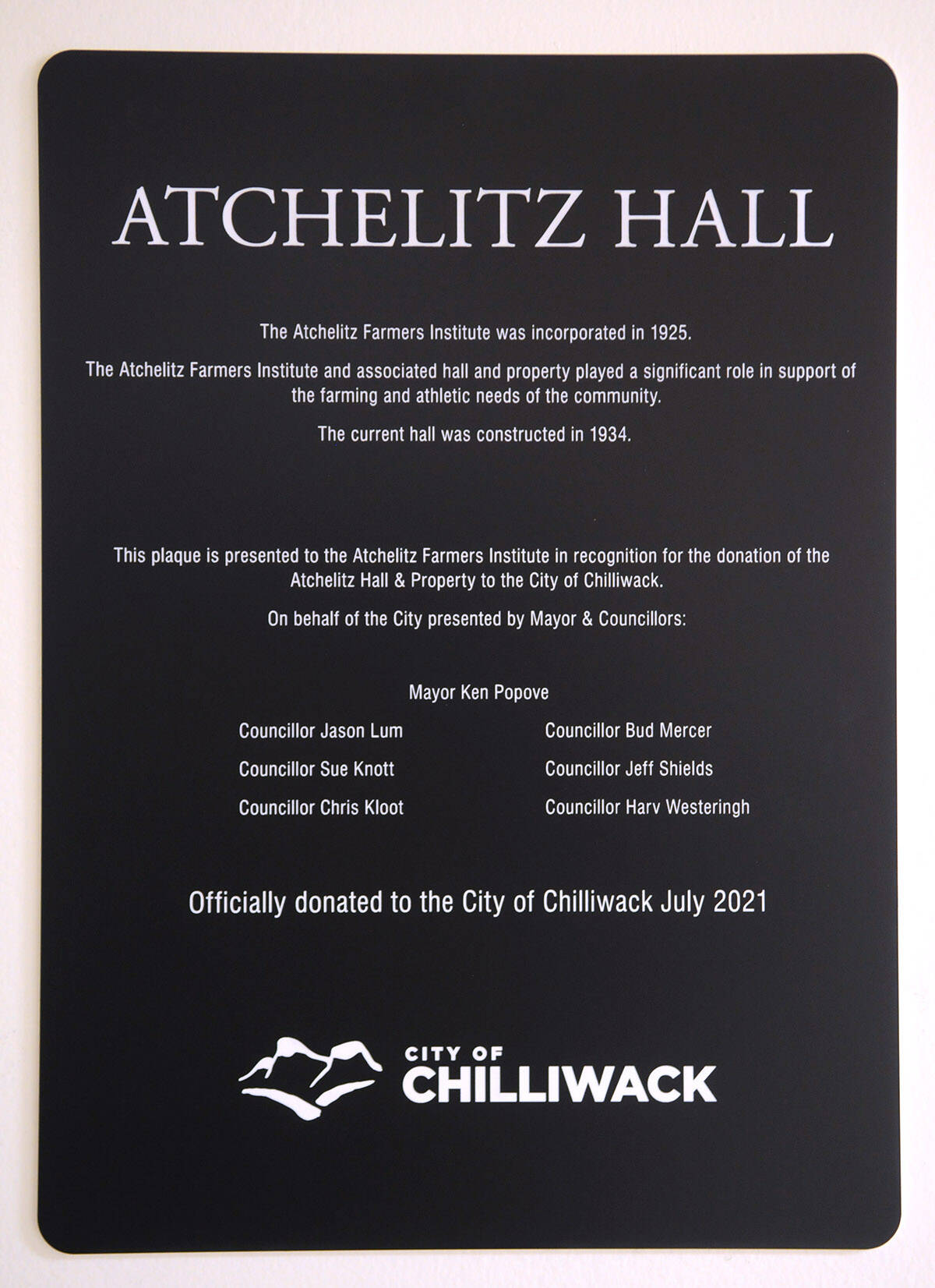 A plaque given to the Atchelitz Farmers Institute after they gifted their property to the City of Chilliwack. (Jenna Hauck/ Chilliwack Progress)