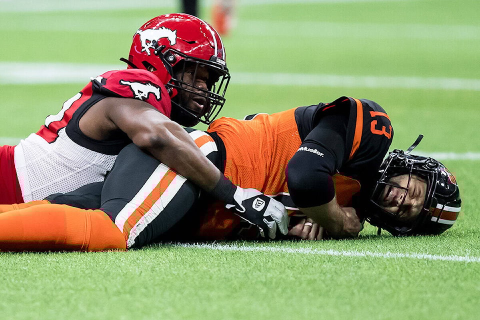 Stampeders clinch CFL playoff spot, eliminate B.C. with 33-23 win