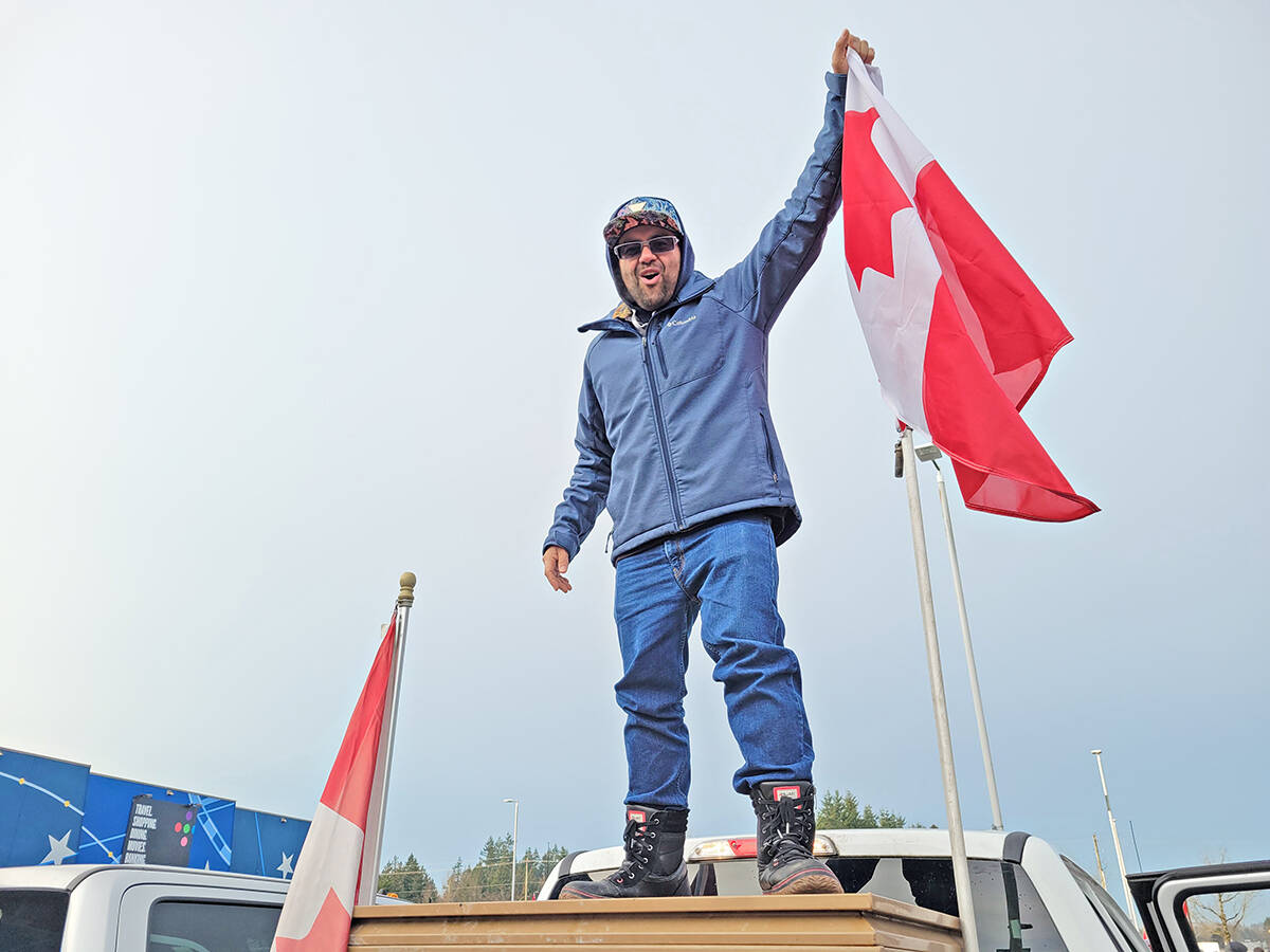 Hundreds turned out in Langley Saturday morning, Jan. 29, to show support for the trucker convoy from B.C. that has arrived in Ottawa to demonstrate against vaccine mandates. (Dan Ferguson/Langley Advance Times)