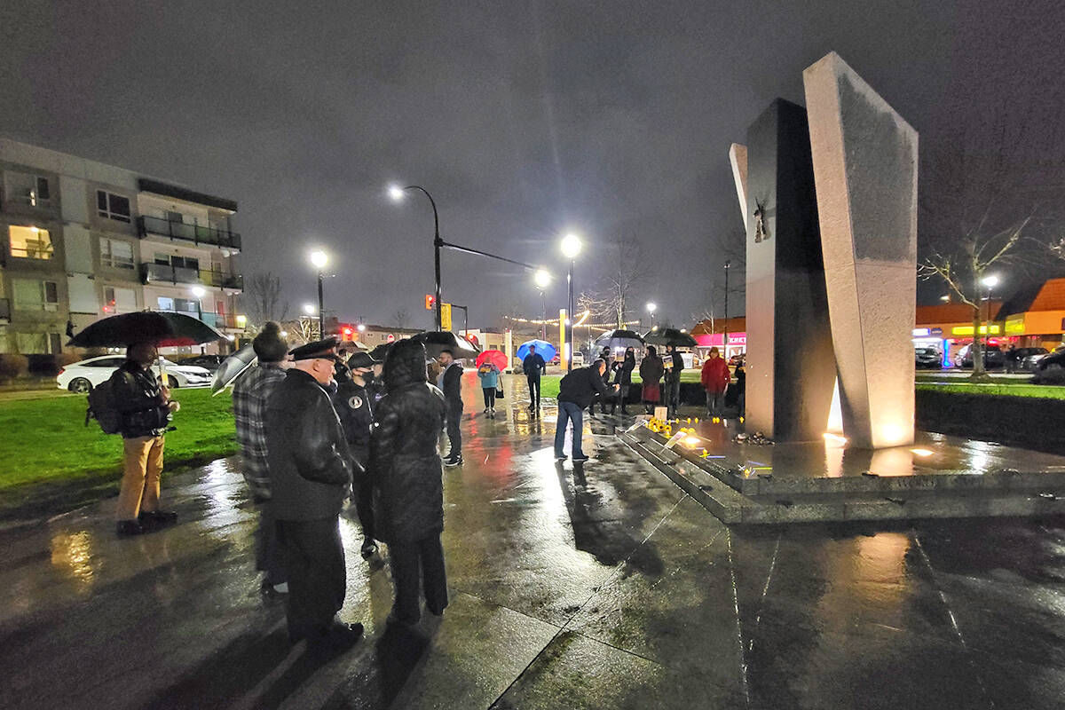 About 30 people took part in a Sunday night (Feb. 27) vigil in Langley for the Ukraine, gathering at the Vineyard church, then walking to the cenotaph in Douglas Park. (Dan Ferguson/Langley Advance Times)