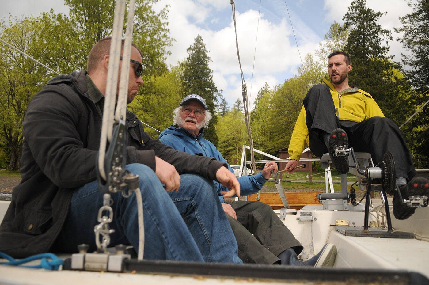 Randy Jensen (centre) and son Lionel Jensen (right) will be competing for the second time in the Race to Alaska, a 1,200-kilometre engineless boat race. They will bring their secret weapon son/brother-in-law James Laton (left) for the first 36-hour portion of the race called the proving grounds. (Jenna Hauck/ Chilliwack Progress)