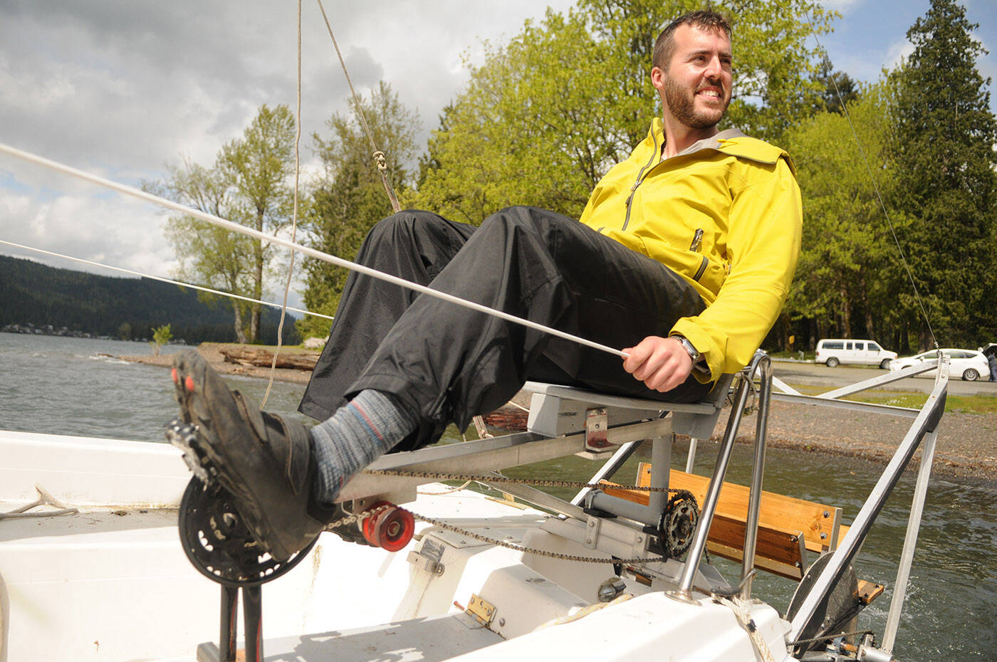 Lionel Jensen pedals the paddlewheel on his and his fathers sailboat. (Jenna Hauck/ Chilliwack Progress)