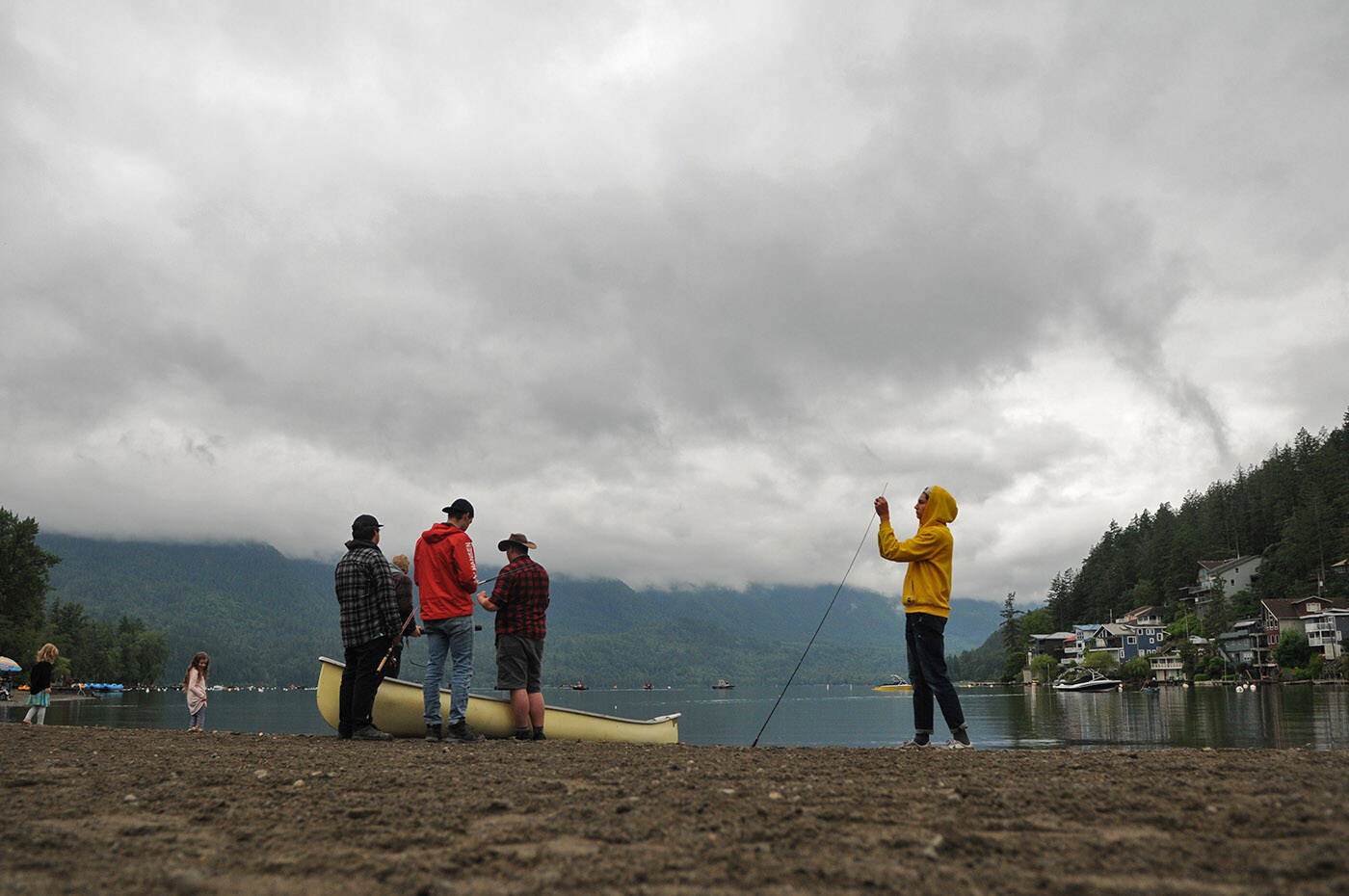 People take part in the 15th annual Cultus Lake Pikeminnow and Smallmouth Bass Fishing Derby at Main Beach on Saturday, June 18, 2022. (Jenna Hauck/ Chilliwack Progress)