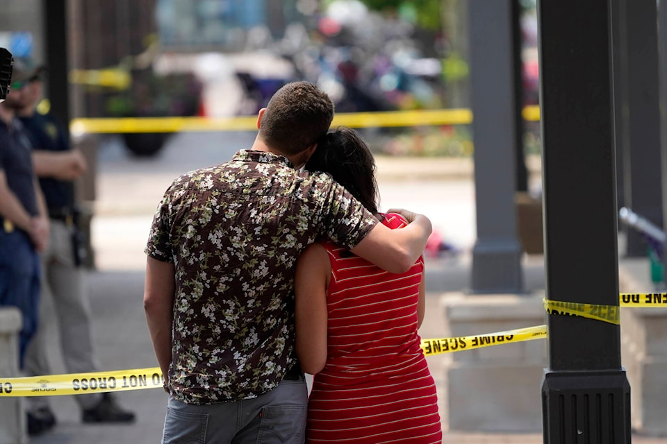 29680178_web1_220705-CPW-CHICAGO-PARADE-SHOOTING-CHARGES-couple_1