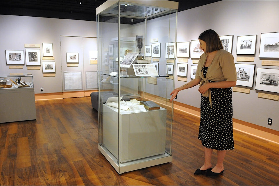 Kate Feltren, curator with the Chilliwack Museum and Archives, talks about travelling exhibition called ‘Where are the Children? Healing the Impacts of the Residential Schools’ which is on display until Oct. 15. The museum has added artifacts and info from the former Coqualeetza Indian Residential School site which was later home to the Coqualeetza Indian Hospital. (Jenna Hauck/ Chilliwack Progress)