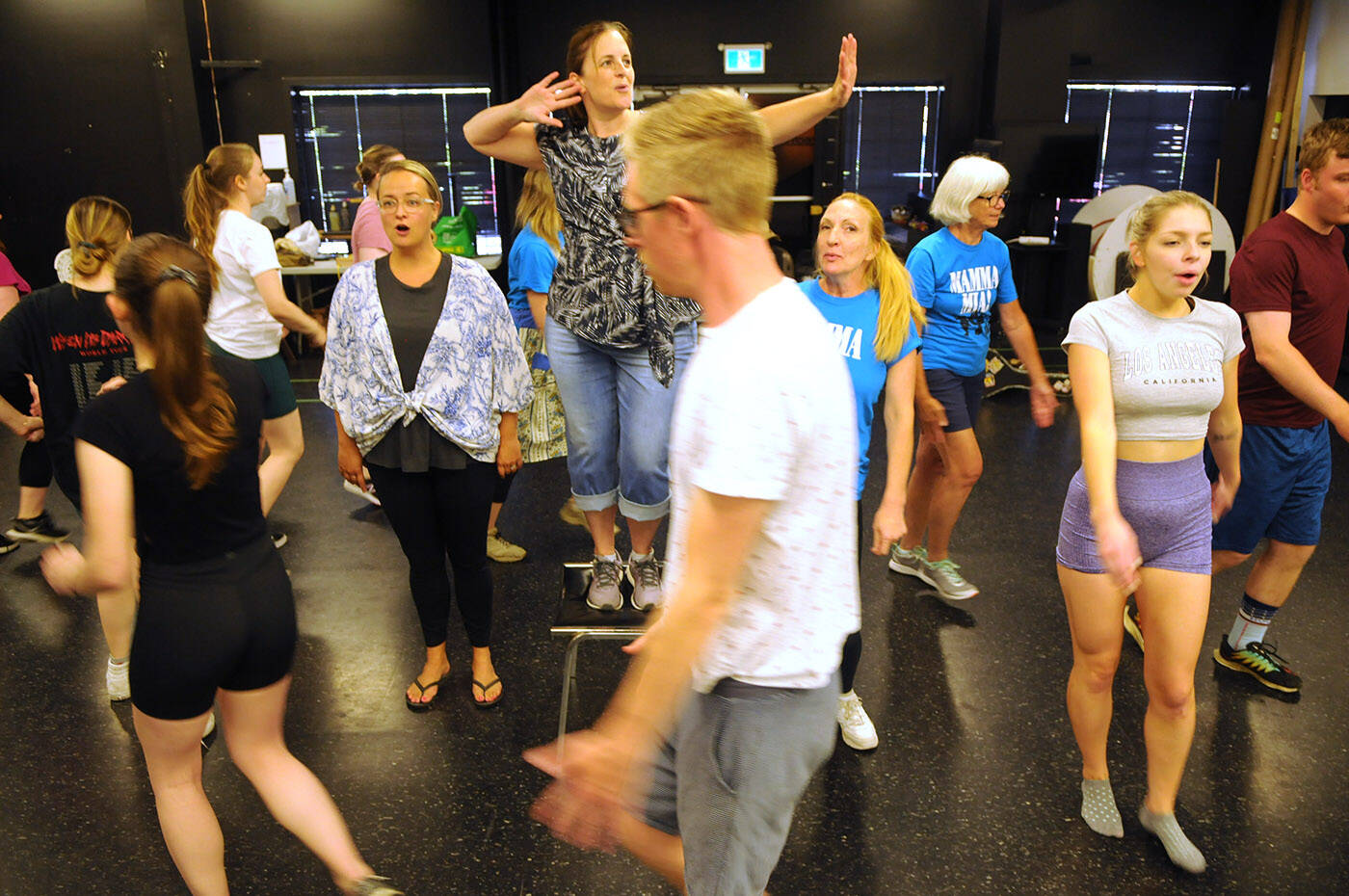 Shelley Wojcik (on chair) plays Donna in Secondary Characters production of Mamma Mia! which is at the Chilliwack Cultural Centre Aug. 11 to 21. (Jenna Hauck/ Chilliwack Progress)