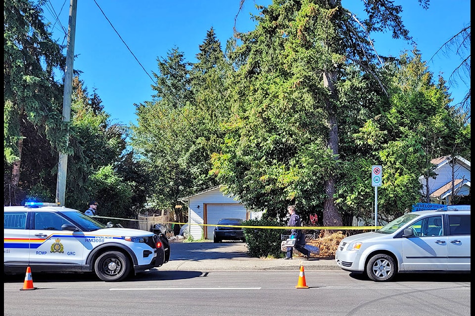Police investigators are at the scene of a shooting at 227th Street and Lee Avenue in Maple Ridge. (Neil Corbett/The News)