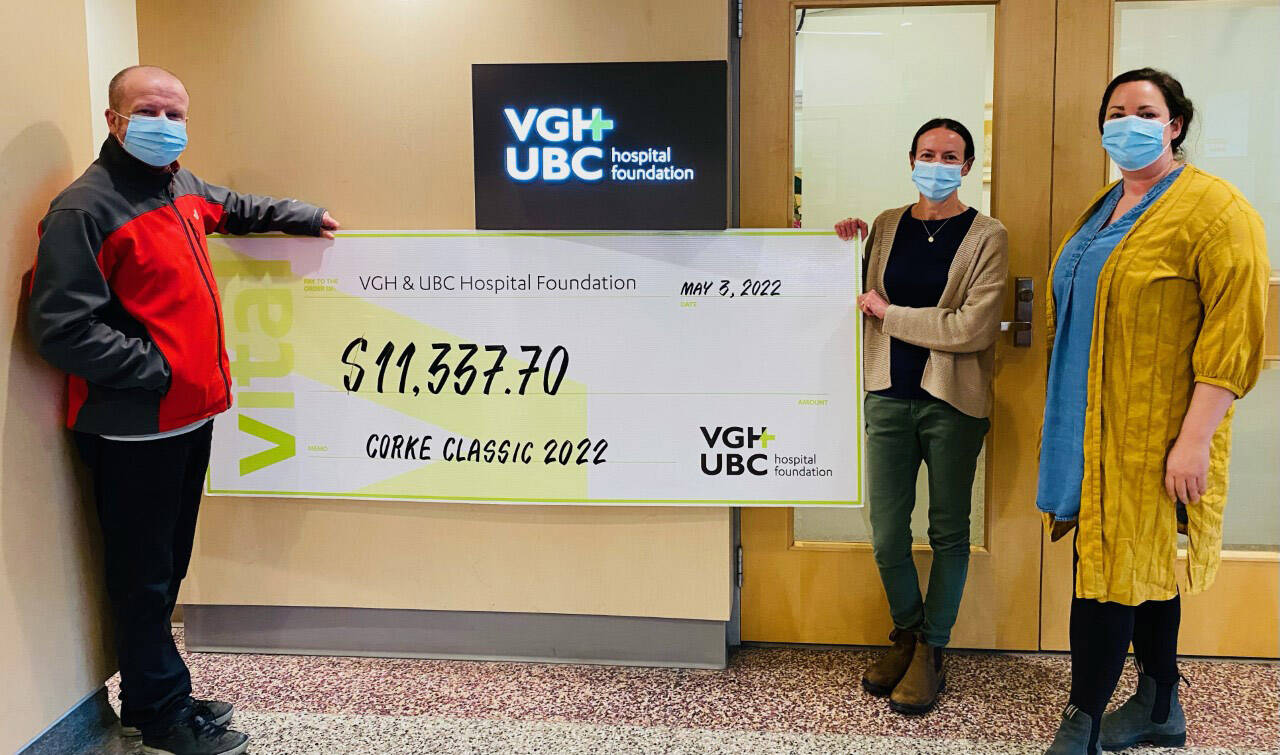 Dave and Vanessa Corke hold a cheque which was presented to Chelsea Wallace, community partnerships officer at VGH Foundation. (Submitted by Vanessa Corke)
