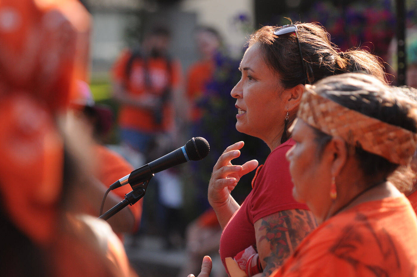 Peggy Janicki speaks at Central Community Park where more than 200 people gathered following a truth and reconciliation walk on Friday, Sept. 30, 2022 in Chilliwack. (Jenna Hauck/ Chilliwack Progress)