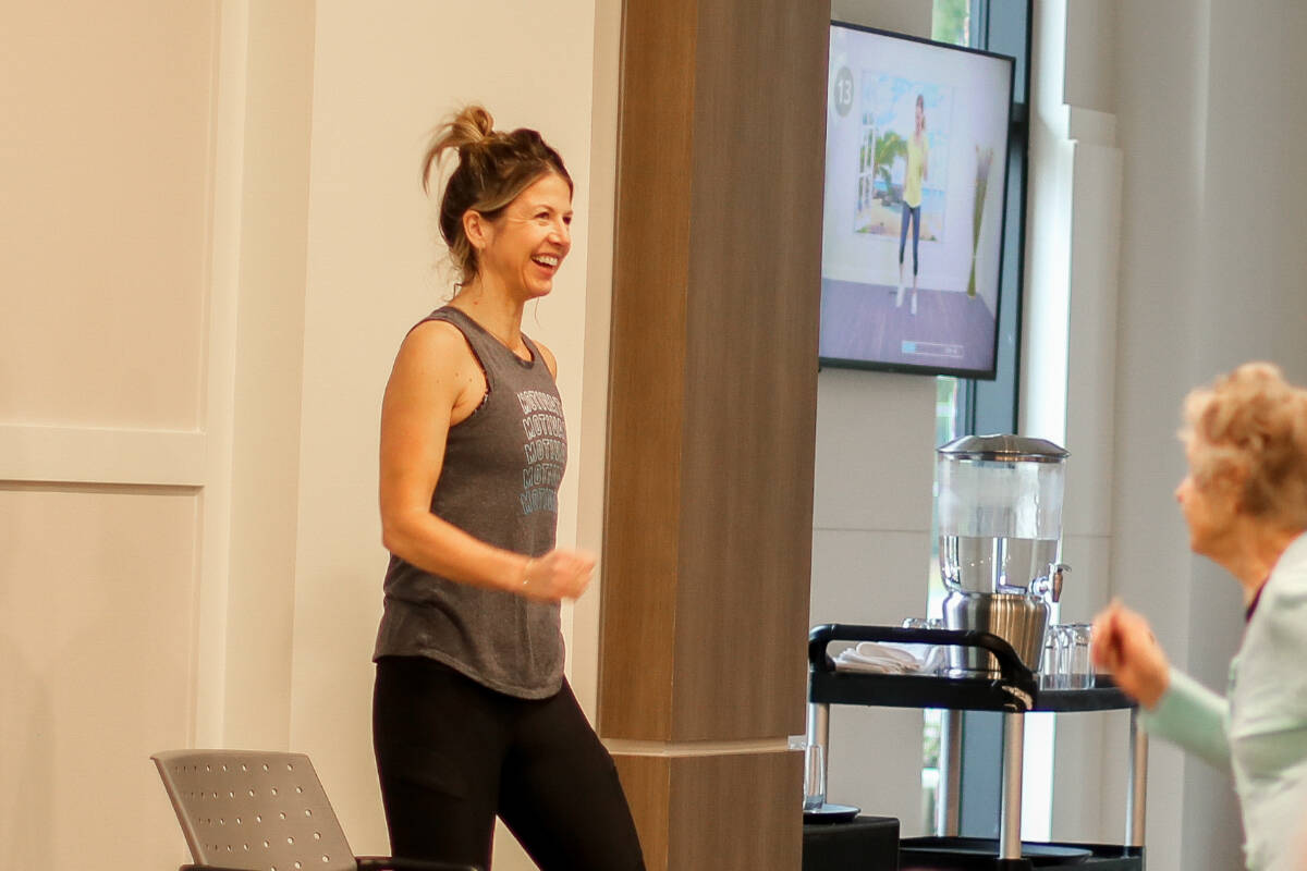 Elim Villages Concierge, Kelly Kallevig leading residents in one of her exercise classes.