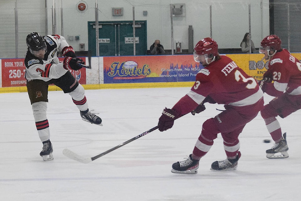 Alberni Valley Bulldogs defenceman Emanuelson Charbonneau fires a shot fast two Chilliwack players during Game 2 of the BCHL’s Coastal Conference finals on Saturday, April 29. Charbonneau had the game-winning goal on Saturday night. (ELENA RARDON / Alberni Valley News)