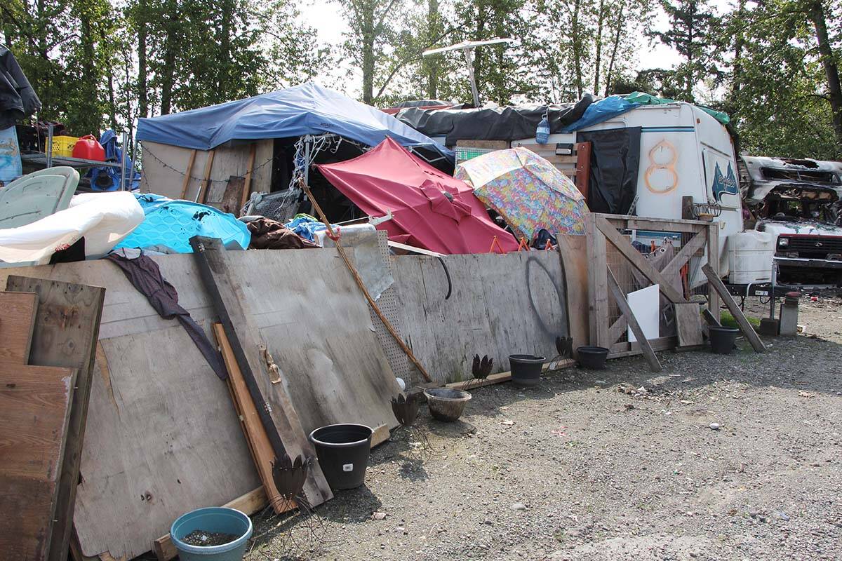 Makeshift shelters can be found amid the motorhomes and campers at the Lonzo Road encampment. (Vikki Hopes/Abbotsford News)