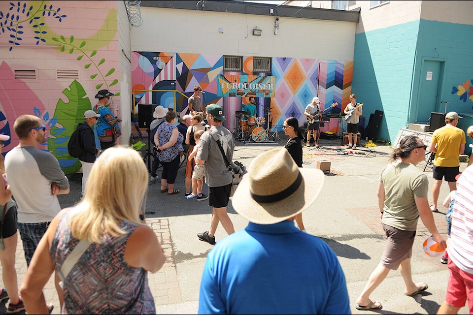 A band plays in Court Lane during the Chilliwack Mural Festival on Saturday, Aug. 12, 2023. (Jenna Hauck/ Chilliwack Progress file)
