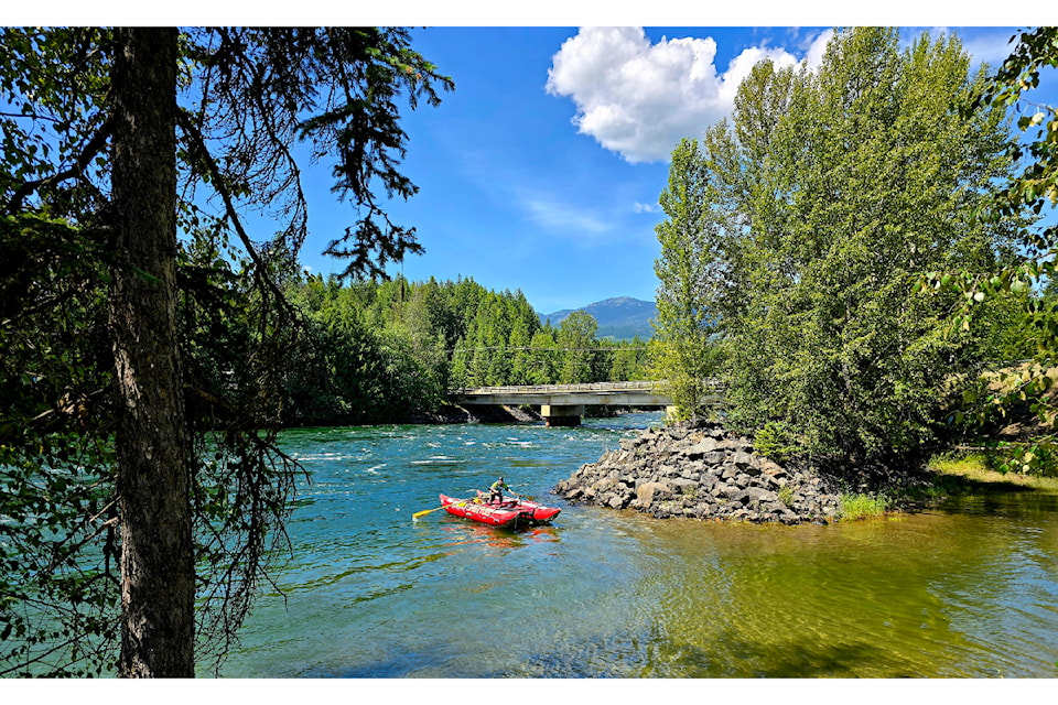 Liquid Lifestyles raft coming ashore off the sparkling Clearwater River on July 13.