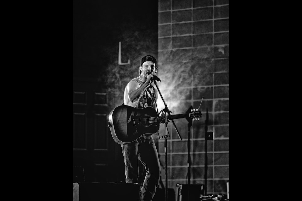 Singer-songwriter Tanner Dawson entertains the crowds at Fadear Park in Barriere on Aug. 30. 
