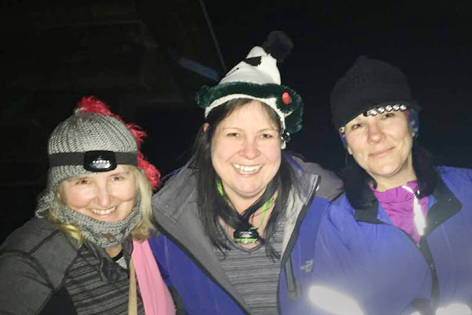 11193335_web1_180301-NTC-SnowshoeNightKim2