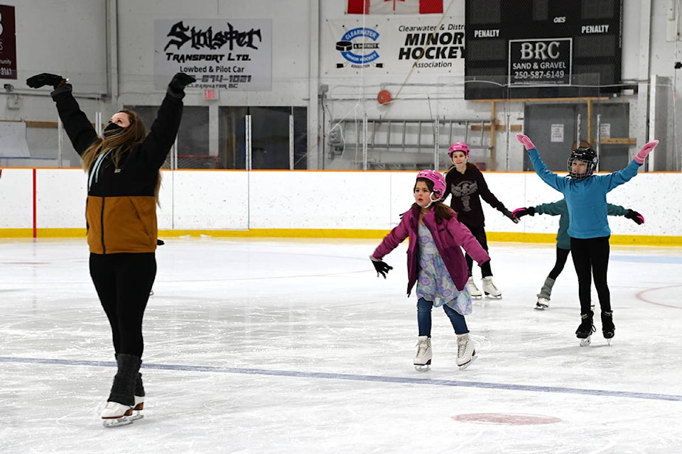 Figure skating coach Chelsea Hindle leads the group in some movements across the ice during their practice on Wednesday (Jan. 20) at the North Thompson Sportsplex. (Stephanie Hagenaars photo)