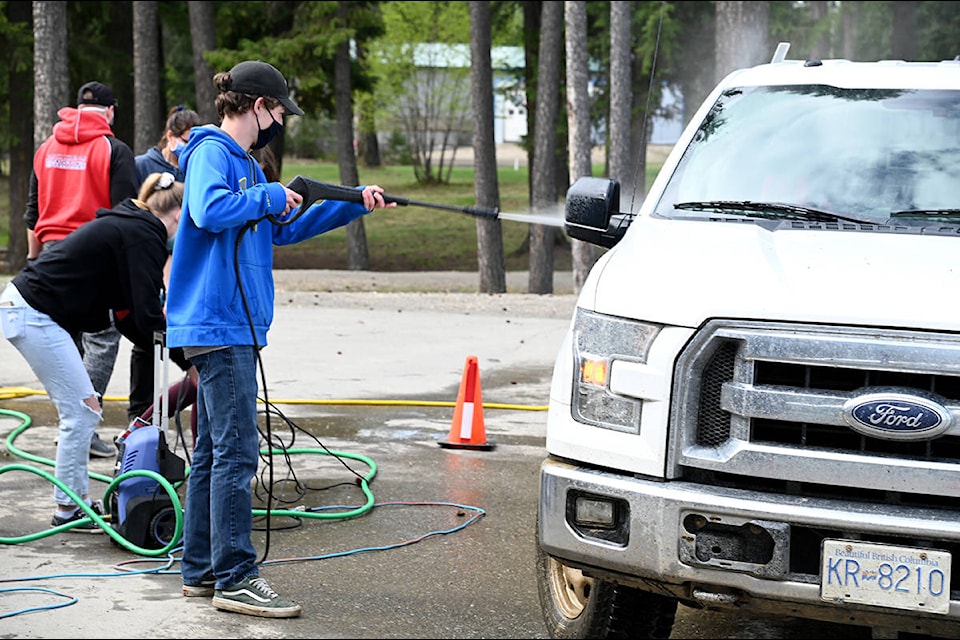 This dusty truck was bright and white once again after Devin Green and the Clearwater Secondary Students were done. The graduating class of 2021 held a car wash as a fundraiser Saturday. (Stephanie Hagenaars photo)